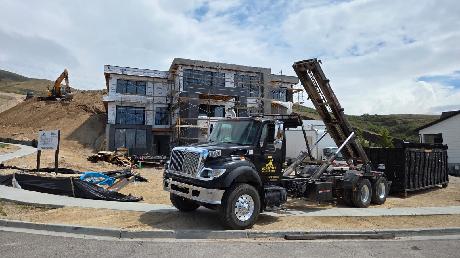 Dumpster on job site